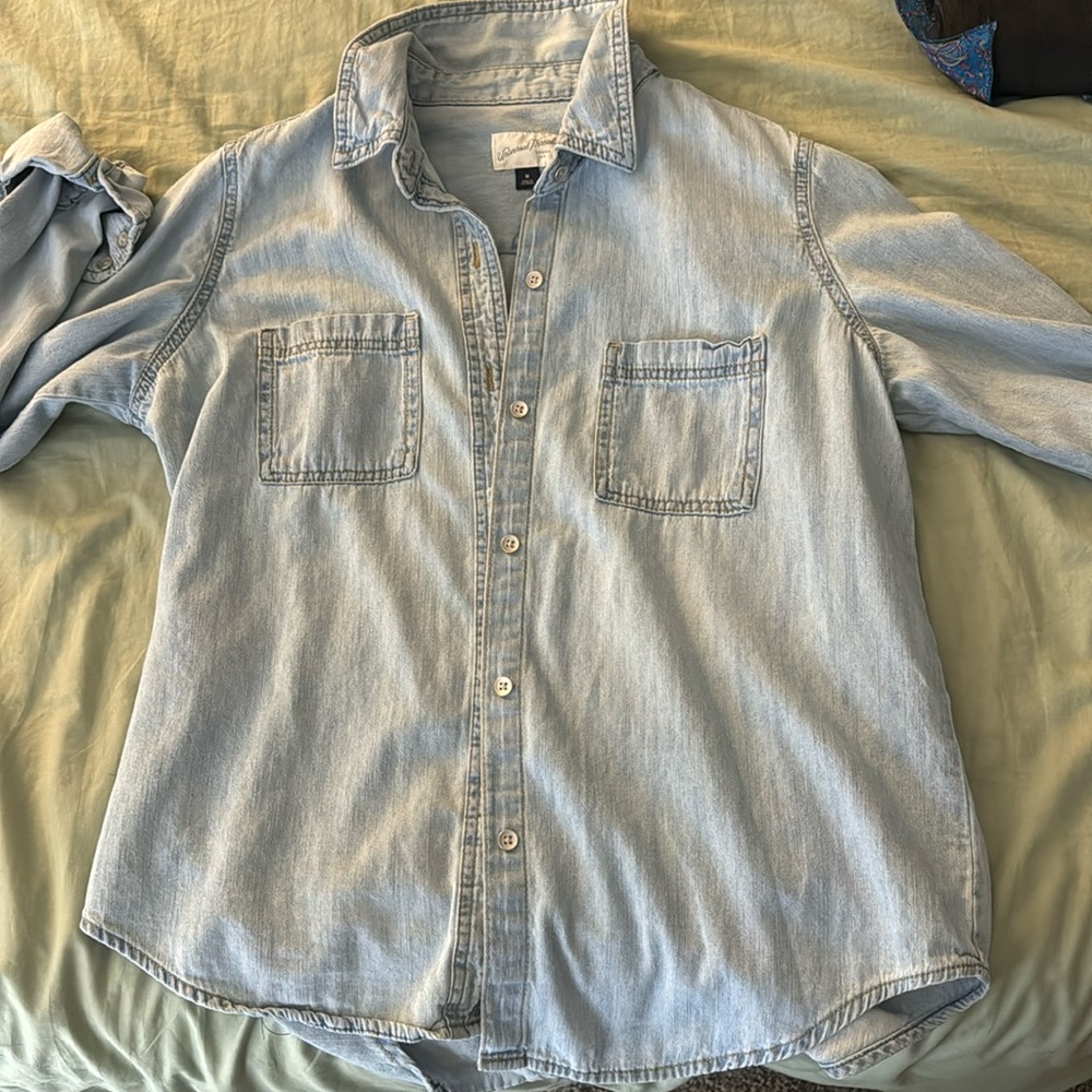 Button down light wash Jean blouse. Brand New- No Tags